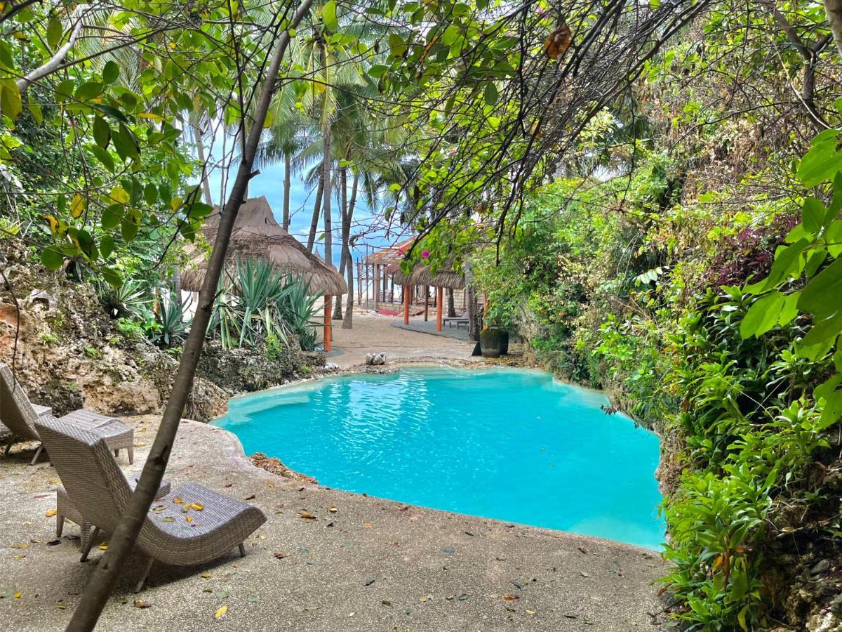 Coco Grove Beach Resort, Siquijor Island Экстерьер фото The swimming pool at the resort
