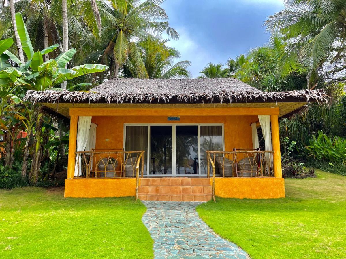 Coco Grove Beach Resort, Siquijor Island Экстерьер фото A bungalow at the resort