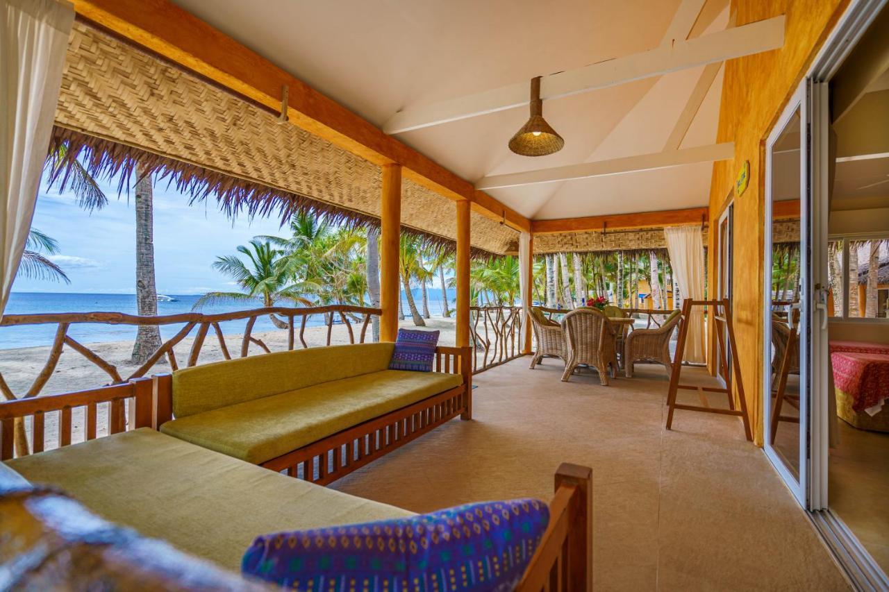 Coco Grove Beach Resort, Siquijor Island Экстерьер фото A view of the beach from the hotel