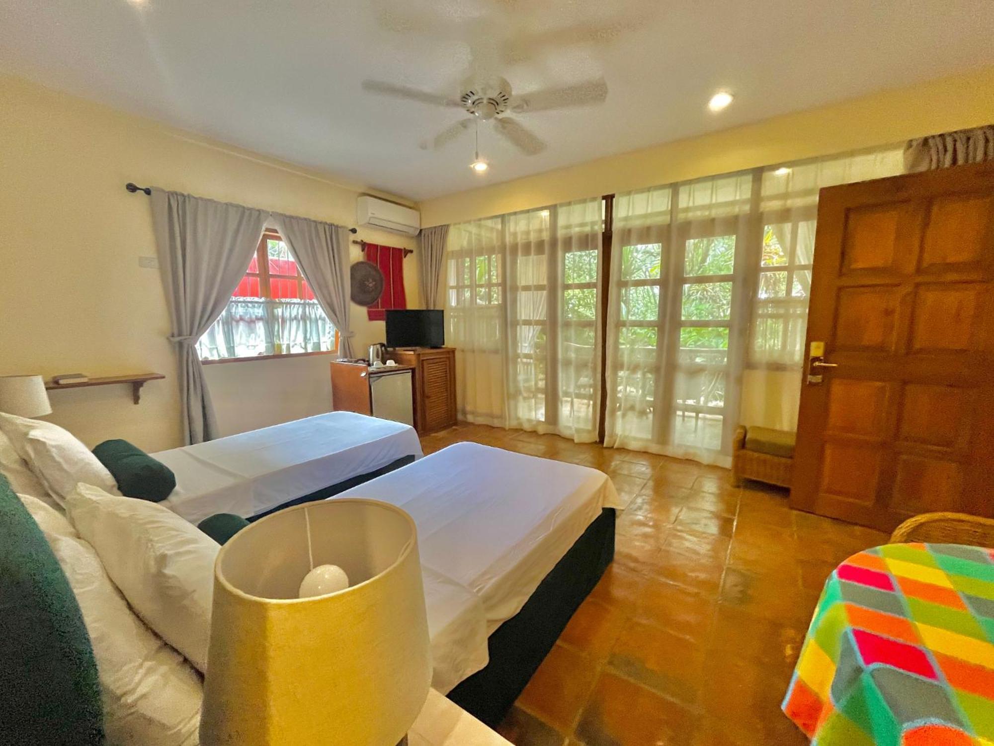 Coco Grove Beach Resort, Siquijor Island Экстерьер фото A bedroom at the resort
