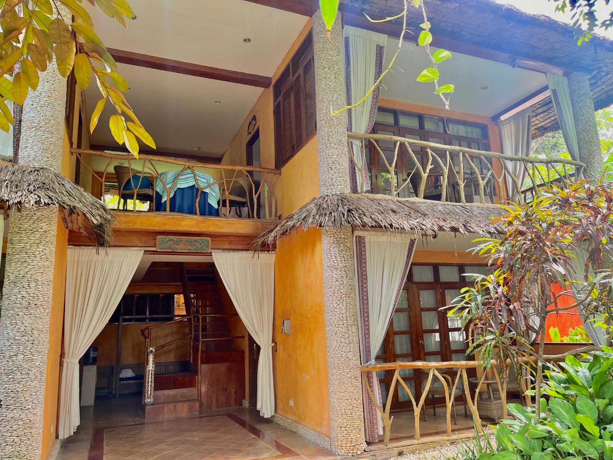 Coco Grove Beach Resort, Siquijor Island Экстерьер фото A villa at the resort