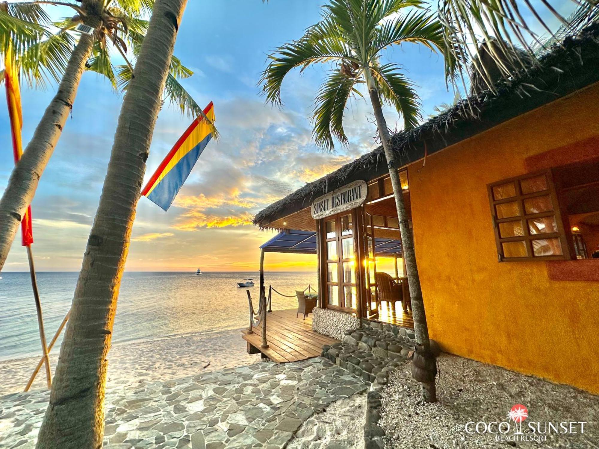 Coco Grove Beach Resort, Siquijor Island Экстерьер фото Sunset at the beach
