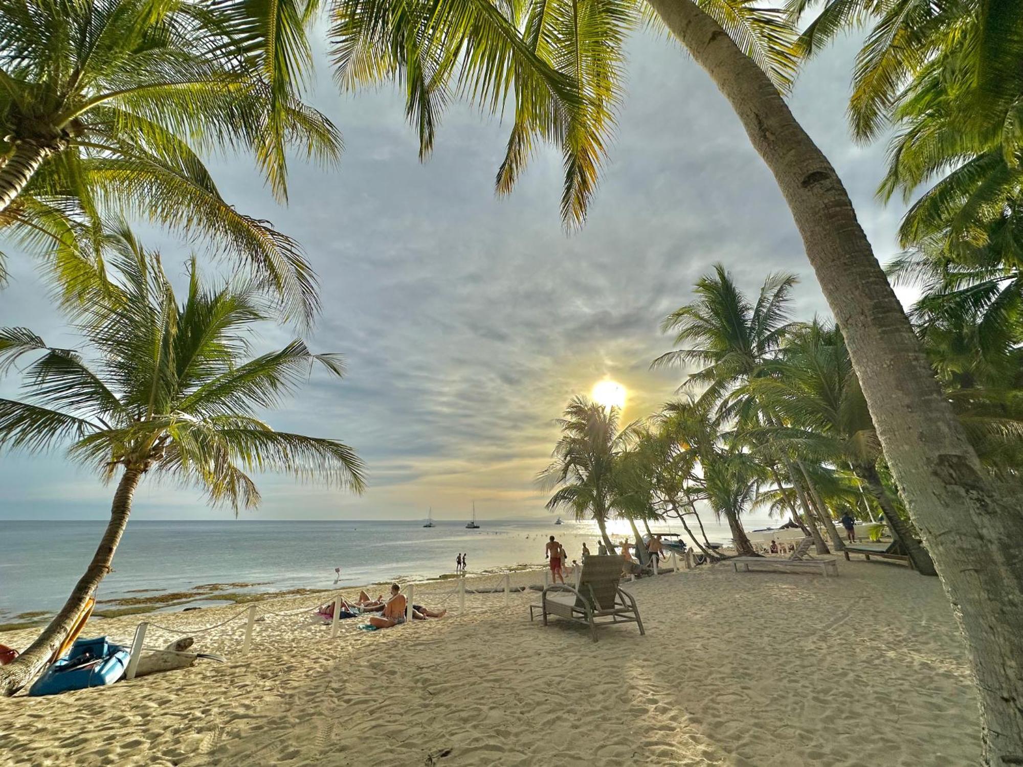 Coco Grove Beach Resort, Siquijor Island Экстерьер фото Sunset at the beach